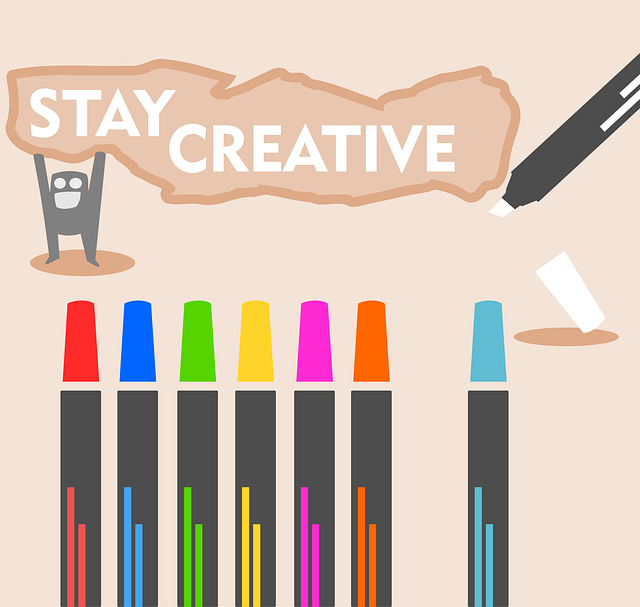 a set of illustrated markers with a banner above reading "Stay Creative"