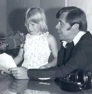 Uncle Charlie recording a youngster for the Children's Bible Hour program