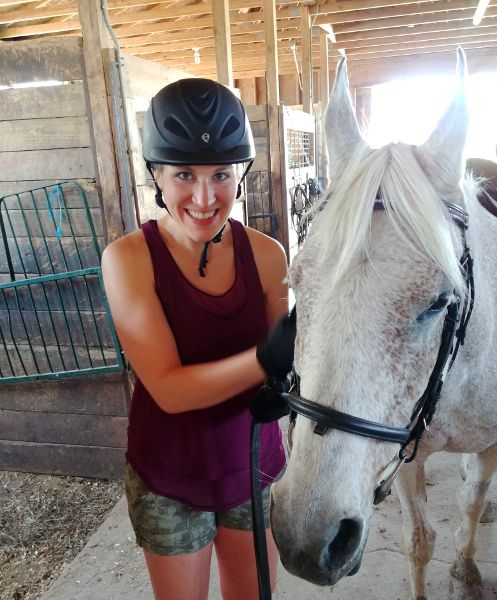Here's my wife with her horse for the day, Koly!
